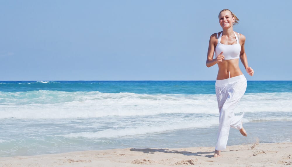 Woman running in beachside