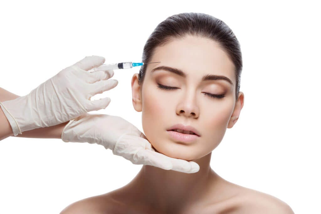 82-1024×683 Female patient being injected with Botox