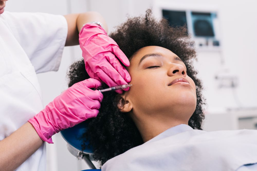BotoxSafeYLSC A woman receiving Botox treatment at a medical spa clinic.