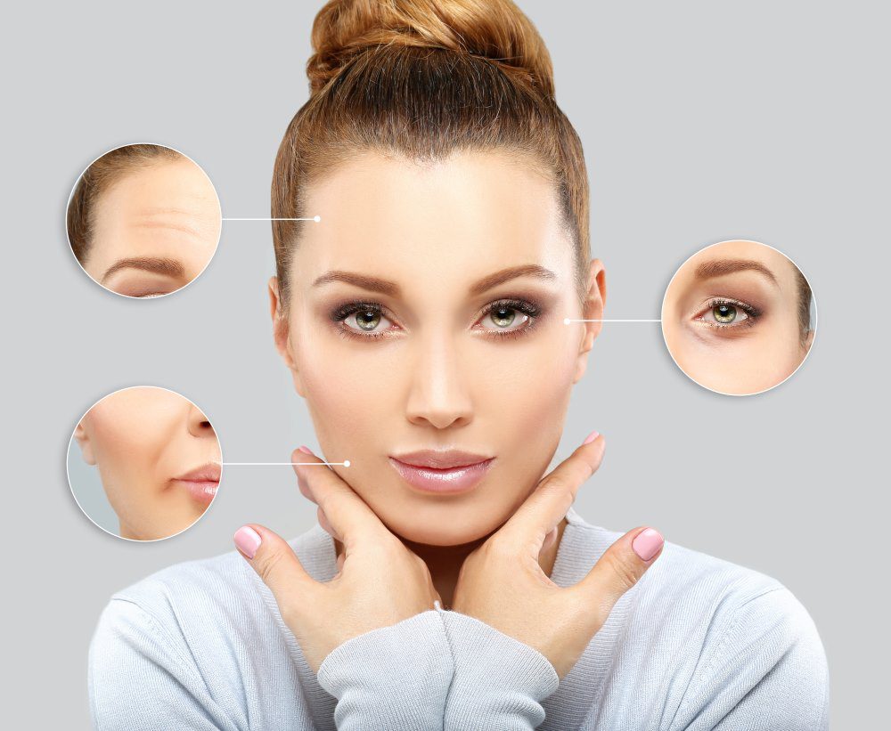 BotoxTreatmentYLSC A woman holding her face freshly after Botox. Botox concept, focusing on forehead, jawline and eyes.