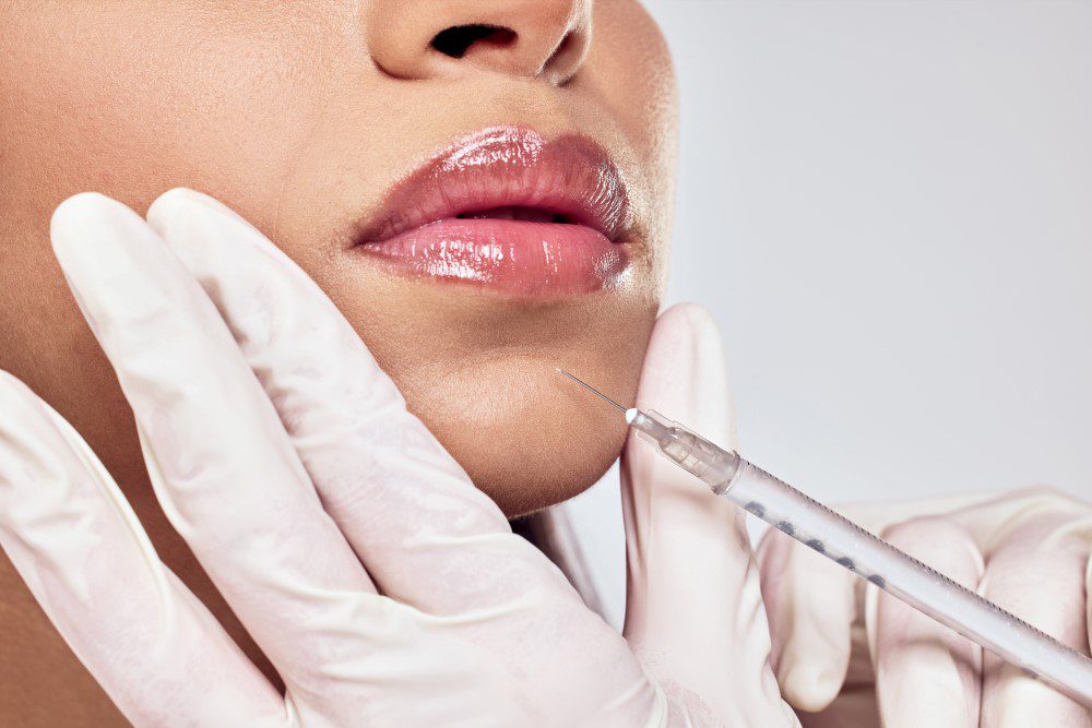 ChinBotoxYLSC A woman receiving Botox injections in her chin by a Botox specialist.