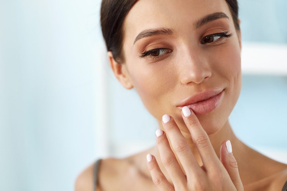 dissolving lip filler woman with dissolved lips after lip filler