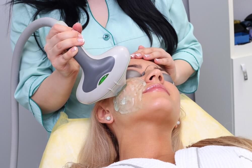 Fading Sun Damage and Age Spots with IPL Photofacials woman getting ipl photofacial after sun damage