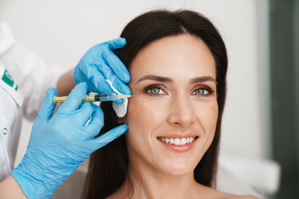Winter Is a Great Time to Have Your Botox Done botox being done on a woman in the winter