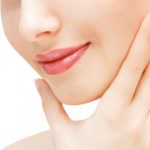 Female face with perfect skin after facial filler